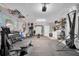 Home gym with various equipment including weights and rowing machine at 5084 42Nd S St, St Petersburg, FL 33711