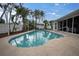 Refreshing kidney-shaped pool perfect for summer enjoyment at 5084 42Nd S St, St Petersburg, FL 33711