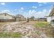 Large backyard with a mostly barren lawn at 5927 3Rd N Ave, St Petersburg, FL 33710