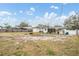 Large backyard with a mostly barren lawn at 5927 3Rd N Ave, St Petersburg, FL 33710