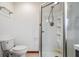 Bathroom featuring toilet and a walk-in shower at 5927 3Rd N Ave, St Petersburg, FL 33710