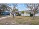 House exterior showcasing a front yard and driveway at 5927 3Rd N Ave, St Petersburg, FL 33710