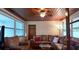 Living area with wood-paneled ceiling and comfortable seating at 5927 3Rd N Ave, St Petersburg, FL 33710