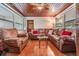 Relaxing living room with leather furniture and wood floors at 5927 3Rd N Ave, St Petersburg, FL 33710