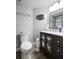 Bathroom with updated vanity and toilet at 6291 Bahia Del Mar Cir # 702, St Petersburg, FL 33715