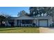 Charming single story home with landscaped lawn and attached garage at 6720 35Th N Ter, St Petersburg, FL 33710