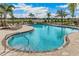 Resort-style pool with plenty of lounge chairs at 699 157Th E Ct, Bradenton, FL 34212