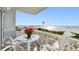 Balcony with chairs and stunning water view at 7 Elgin Pl # 603, Dunedin, FL 34698