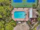 Community pool with surrounding lounge chairs at 822 Addison Ne Dr, St Petersburg, FL 33716