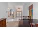 View of a dining room with a table, chairs, and access to the entryway at 8936 Hargrove Dr, Hudson, FL 34667