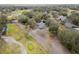 Property view, including road and nearby golf course at 10308 Forest Hills Dr, Tampa, FL 33612