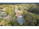 Home situated near golf course with pond and city skyline at 10308 Forest Hills Dr, Tampa, FL 33612