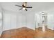 Bedroom with hardwood floors and double door closets at 10308 Forest Hills Dr, Tampa, FL 33612