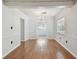 Dining room with hardwood floors and chandelier at 10308 Forest Hills Dr, Tampa, FL 33612