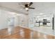 Dining room with hardwood and kitchen view at 10308 Forest Hills Dr, Tampa, FL 33612