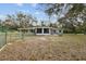 Newly painted home with carport and spacious yard at 10308 Forest Hills Dr, Tampa, FL 33612