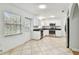 Kitchen with white cabinets and stainless steel appliances at 10308 Forest Hills Dr, Tampa, FL 33612