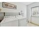 Laundry room with washer, dryer, and exterior access at 10308 Forest Hills Dr, Tampa, FL 33612