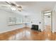 Living room with hardwood floors and fireplace at 10308 Forest Hills Dr, Tampa, FL 33612
