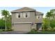 Two-story house with gray siding, gray roof, and a two-car garage at 10828 Hidden Banks Gln, Parrish, FL 34219