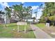 Boca Ciega Mill Park entrance with paved pathway and waterfront views at 1145 Boca Ciega Isle Dr, St Pete Beach, FL 33706