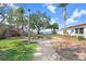 Pathway through park with benches and waterfront views at 1145 Boca Ciega Isle Dr, St Pete Beach, FL 33706
