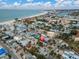 Aerial view showing the property near the beach and ocean at 130 90Th Ave, Treasure Island, FL 33706