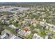 Aerial view showcasing the property's location in a residential community at 1581 Amberlea S Dr, Dunedin, FL 34698