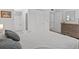Bedroom with double bed, dresser, and en-suite bathroom at 1581 Amberlea S Dr, Dunedin, FL 34698