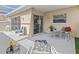 Spacious patio with comfortable seating and a relaxing view at 1581 Amberlea S Dr, Dunedin, FL 34698
