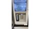 Stainless steel refrigerator with beverage center and water dispenser at 1581 Amberlea S Dr, Dunedin, FL 34698