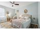 Light and airy bedroom with a queen-size bed and neutral color palette at 15811 Oakleaf Run Dr, Lithia, FL 33547