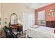 Bedroom with a vanity and double door closet at 15811 Oakleaf Run Dr, Lithia, FL 33547