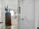 Bedroom with a dresser and access to a closet and other rooms at 15811 Oakleaf Run Dr, Lithia, FL 33547