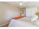 Spacious bedroom with a double bed and walk-in closet at 15811 Oakleaf Run Dr, Lithia, FL 33547