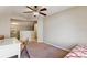 Bedroom featuring a twin bed, desk, and open loft area at 15811 Oakleaf Run Dr, Lithia, FL 33547
