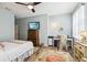 Charming bedroom with a desk area, perfect for a home office at 15811 Oakleaf Run Dr, Lithia, FL 33547