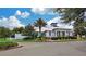Elegant community clubhouse with landscaped grounds at 15811 Oakleaf Run Dr, Lithia, FL 33547