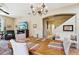 Charming dining room features a rustic table and built-in bench at 15811 Oakleaf Run Dr, Lithia, FL 33547