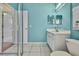 Clean bathroom with a shower, toilet, and vanity at 19820 Morden Blush Dr, Lutz, FL 33558