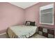 Bedroom with a double bed and window at 19820 Morden Blush Dr, Lutz, FL 33558