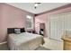 Bedroom with double bed and a built-in dresser at 19820 Morden Blush Dr, Lutz, FL 33558