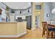 Modern kitchen with stainless steel appliances and light wood cabinets at 19820 Morden Blush Dr, Lutz, FL 33558