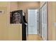 Laundry room with arcade game and access to other rooms at 19820 Morden Blush Dr, Lutz, FL 33558