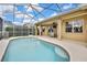 Enjoy this lovely screened pool and patio area at 19820 Morden Blush Dr, Lutz, FL 33558