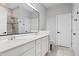 Double vanity bathroom with modern fixtures and a large shower at 2146 Laceflower Dr, Brandon, FL 33510