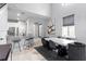 Elegant dining area with marble table and modern chairs at 2146 Laceflower Dr, Brandon, FL 33510
