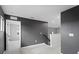 Upper hallway with dark gray walls and carpet at 2146 Laceflower Dr, Brandon, FL 33510