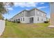 Exterior view of house with backyard and fence at 2146 Laceflower Dr, Brandon, FL 33510