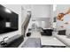 Open living room with high ceilings, modern staircase, and kitchen views at 2146 Laceflower Dr, Brandon, FL 33510